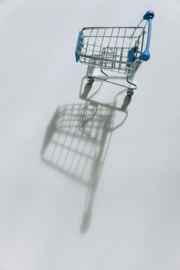 Blue Shopping Cart on White Table